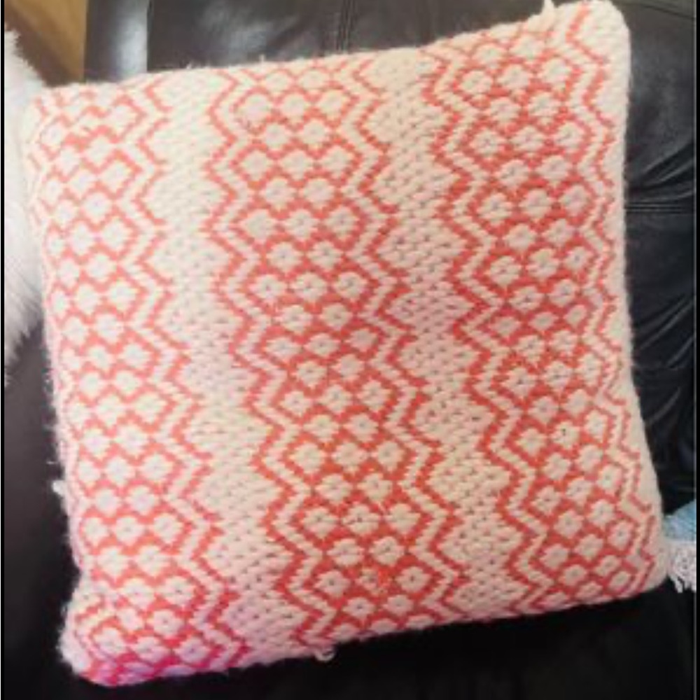 Coral and cream pillow